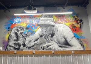 Photo of mural inside Longshotz Golf. Photo submitted by Baylee Toshack.